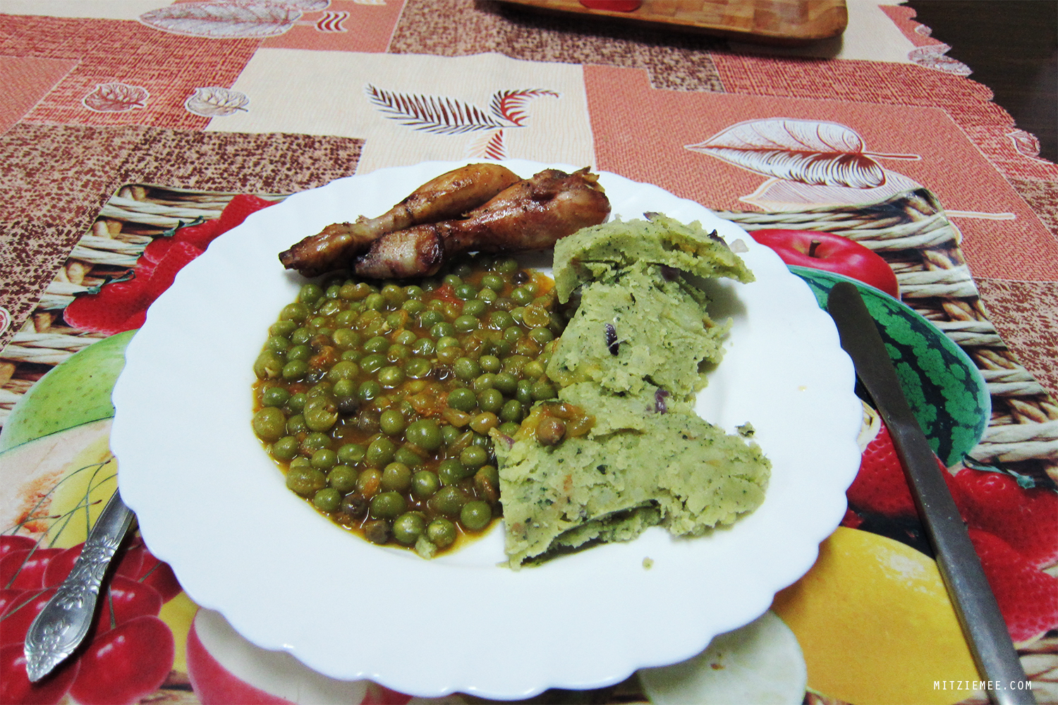 Kenyan food - chicken, peas and mashed potatoes