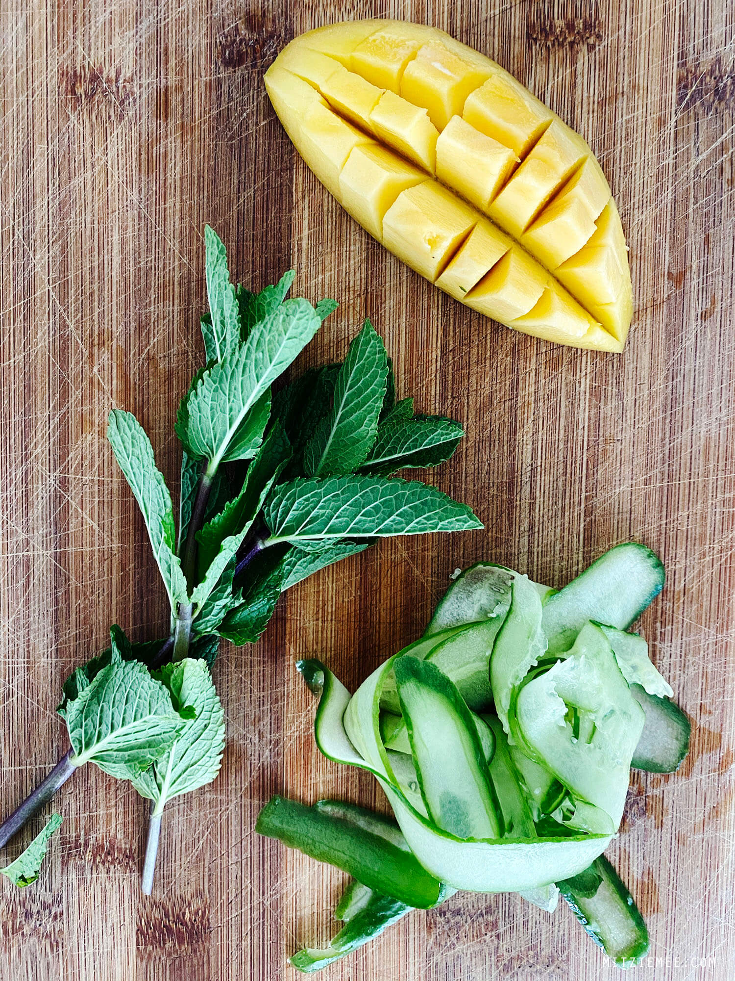 Infused water with mango, mint and cucumber