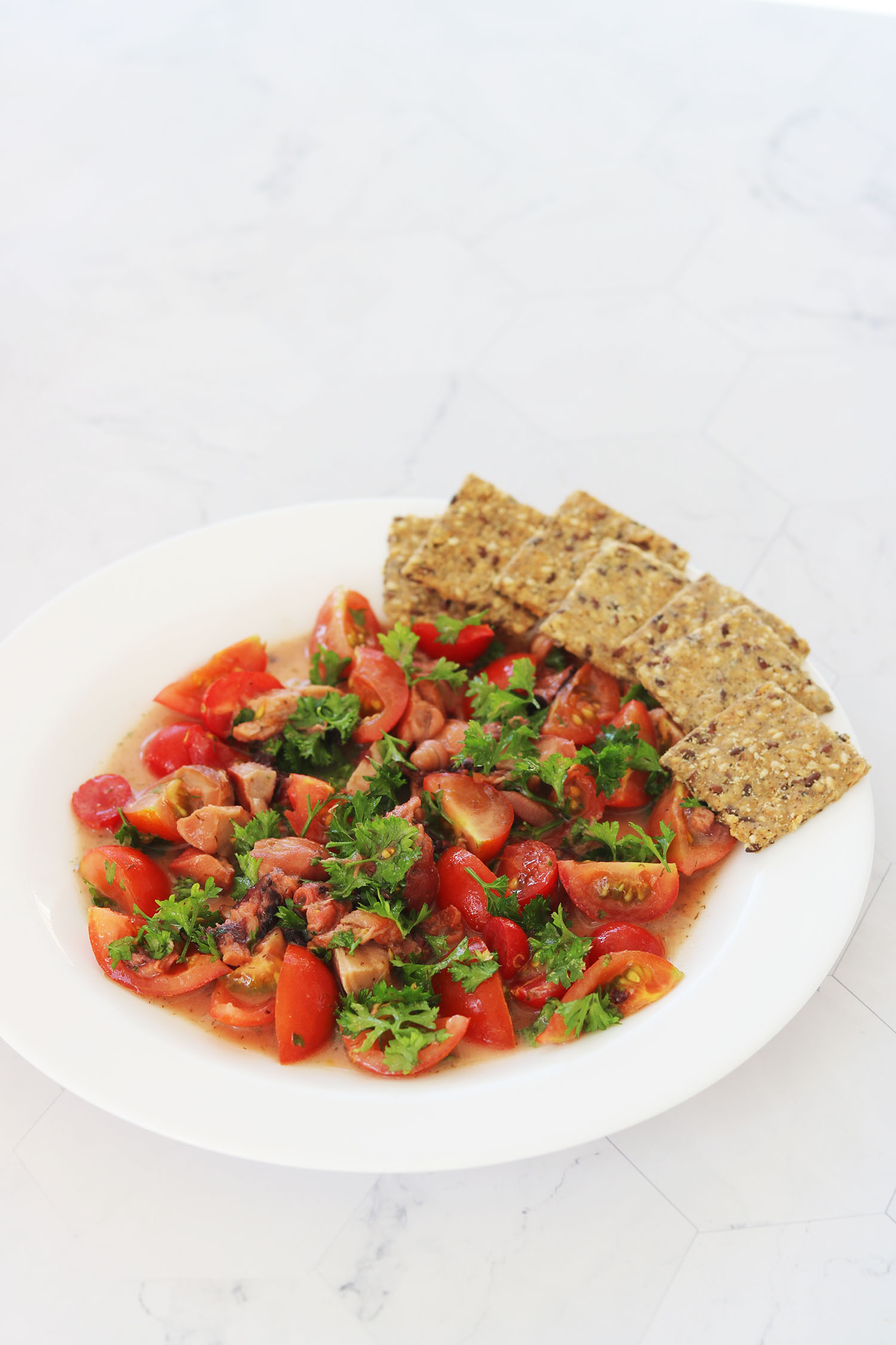 Recipe: Octopus salad with tomatoes and parsley