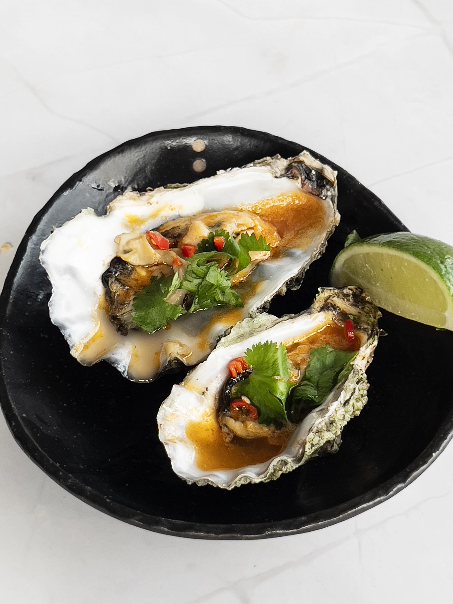 Oysters in tom yum butter