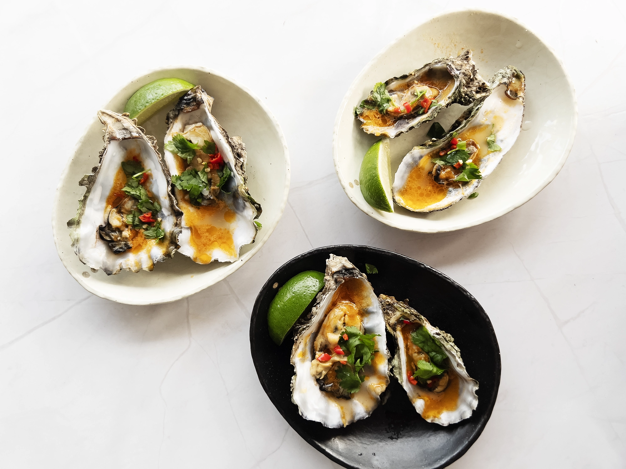 Oysters in tom yum butter